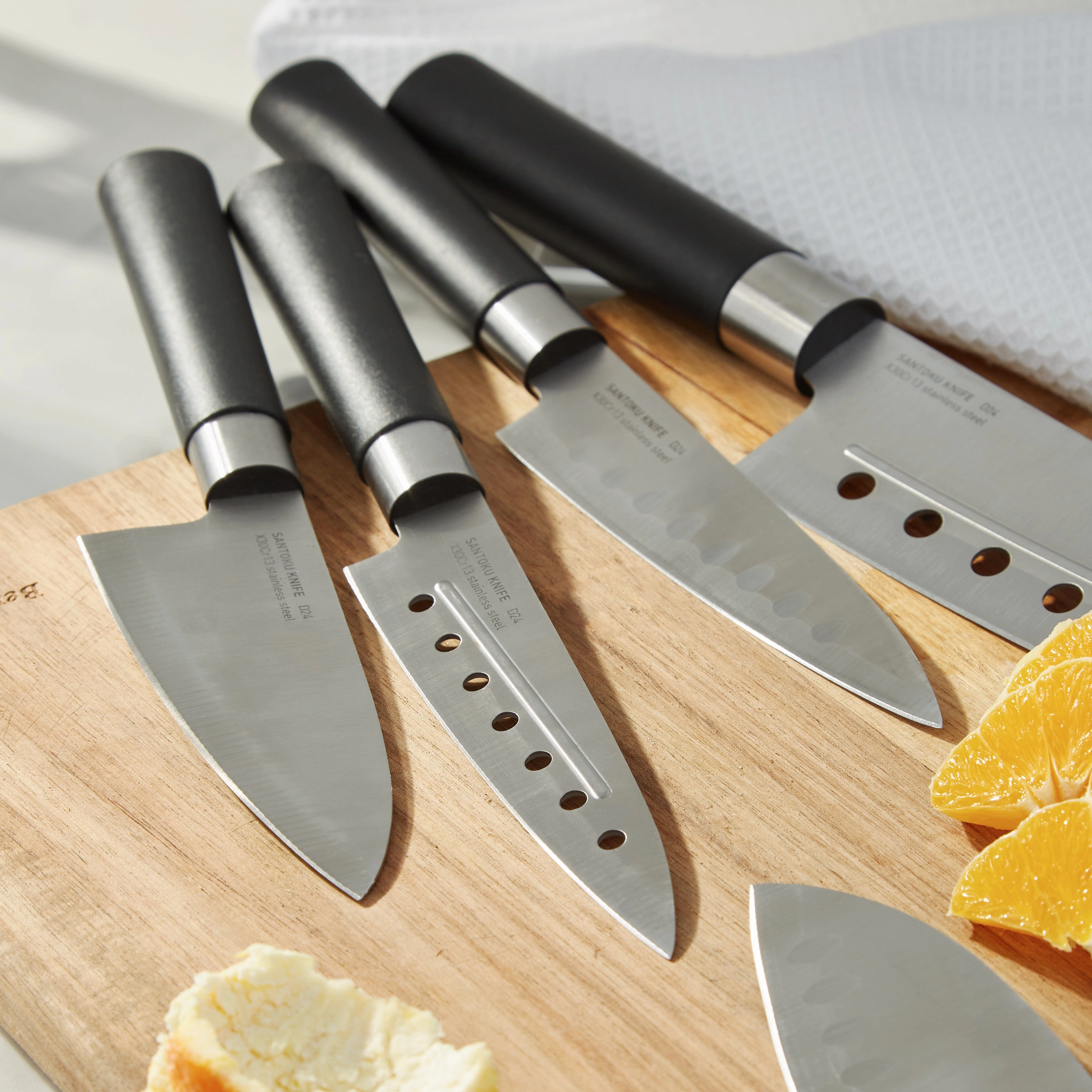BergHOFF DiNA Codon Stainless Steel Santoku Knife with Holes, 5"