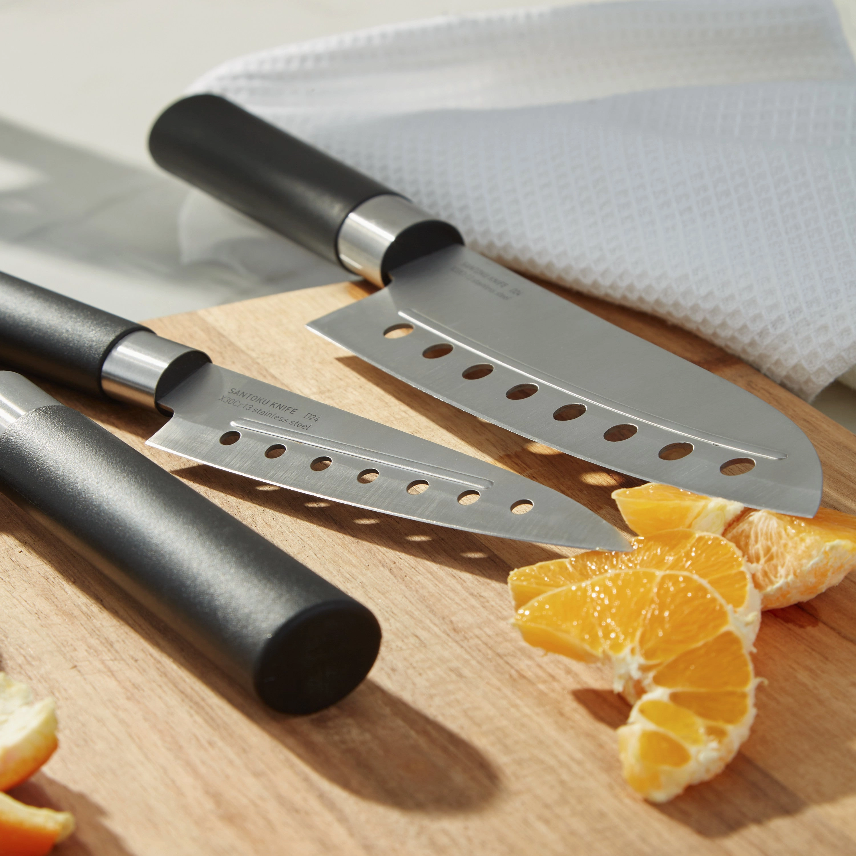 BergHOFF DiNA Codon Stainless Steel Santoku Knife with Holes, 5"