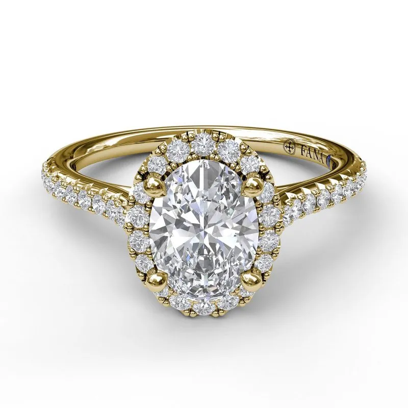 Delicate Oval Shaped Halo And Pave Band Engagement Ring