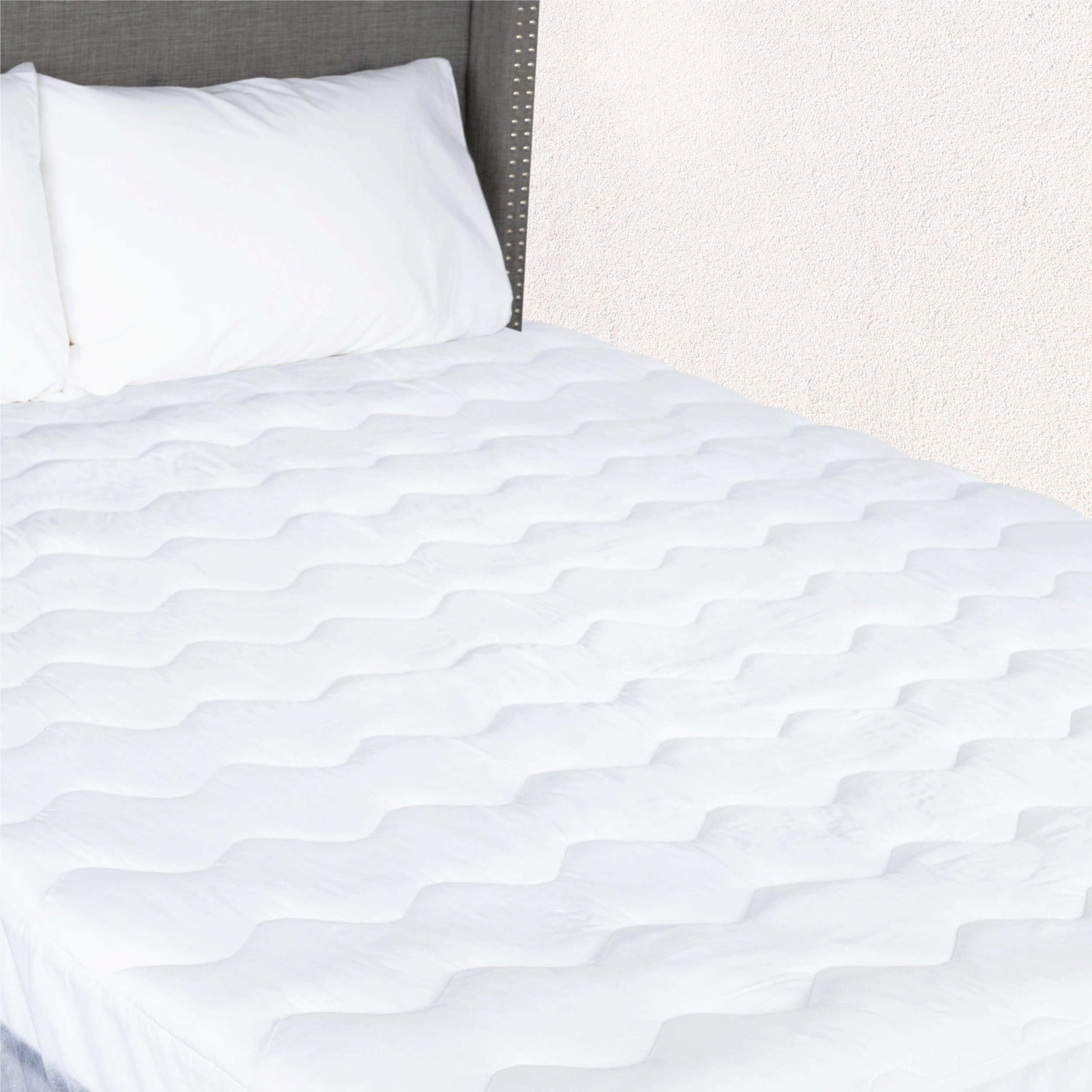 Live Comfortably 100 Percent Peachy Polyester Mattress Pad