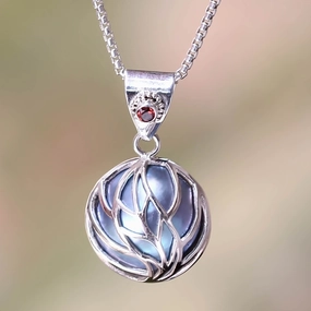 Secret World Blue Mabe Pearl Garnet and Silver Handcrafted Necklace