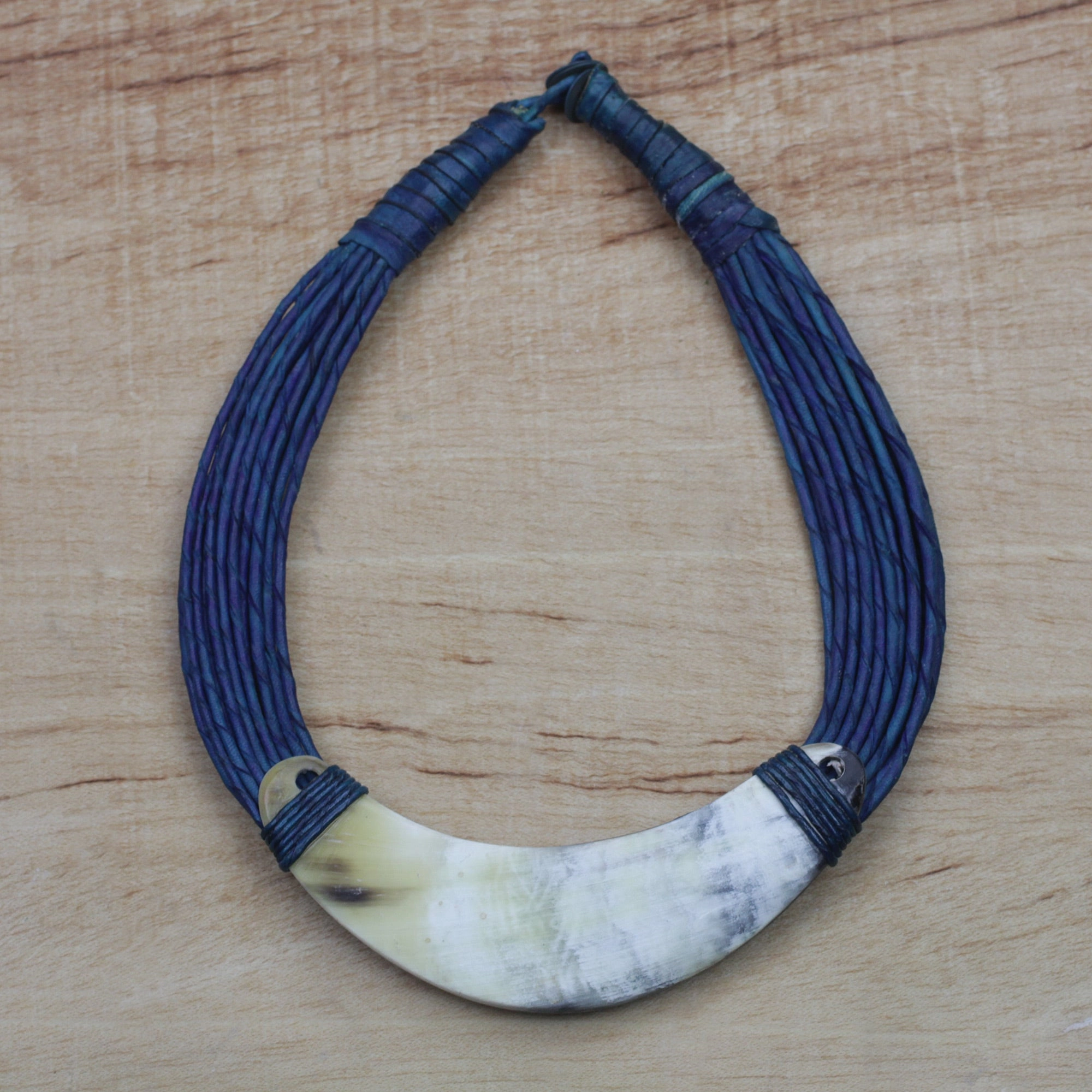 Sida Crescent-Shaped Horn Pendant Necklace with Blue Leather Cord